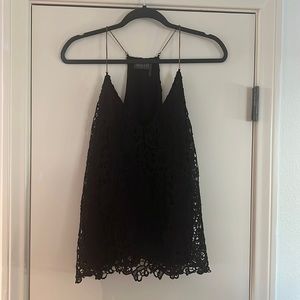 ASTR Black Top with gold accent straps, size large